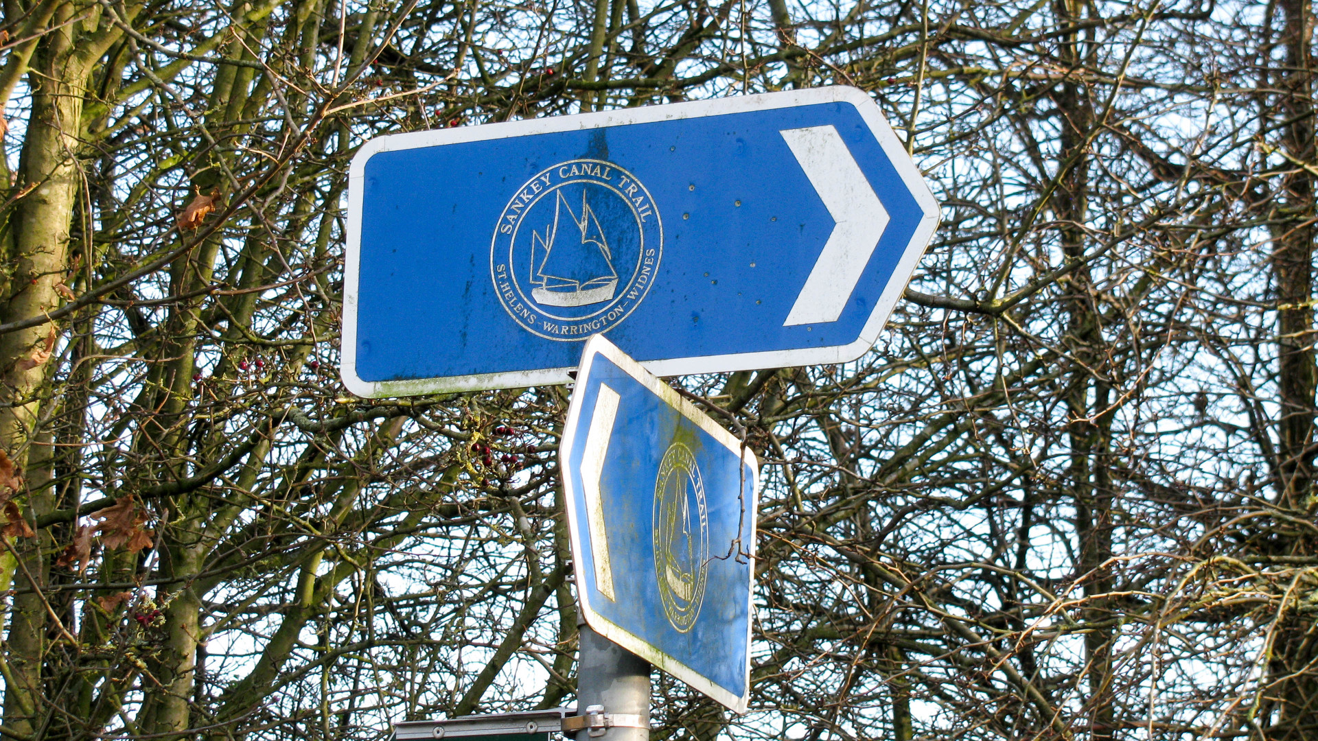 Clear signs for the Sankey Canal Trail which follows the line of the canal